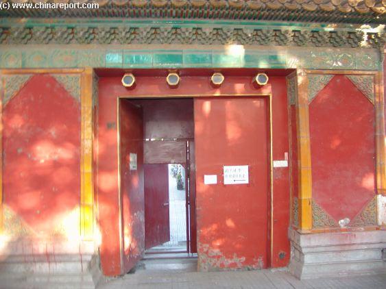 An ancient Hutong Alley with small Greenhouses ...